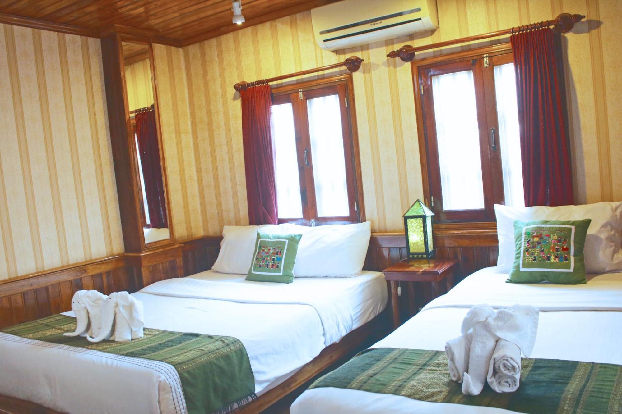לואנג פרבאנג Apple Guesthouse חדר תמונה