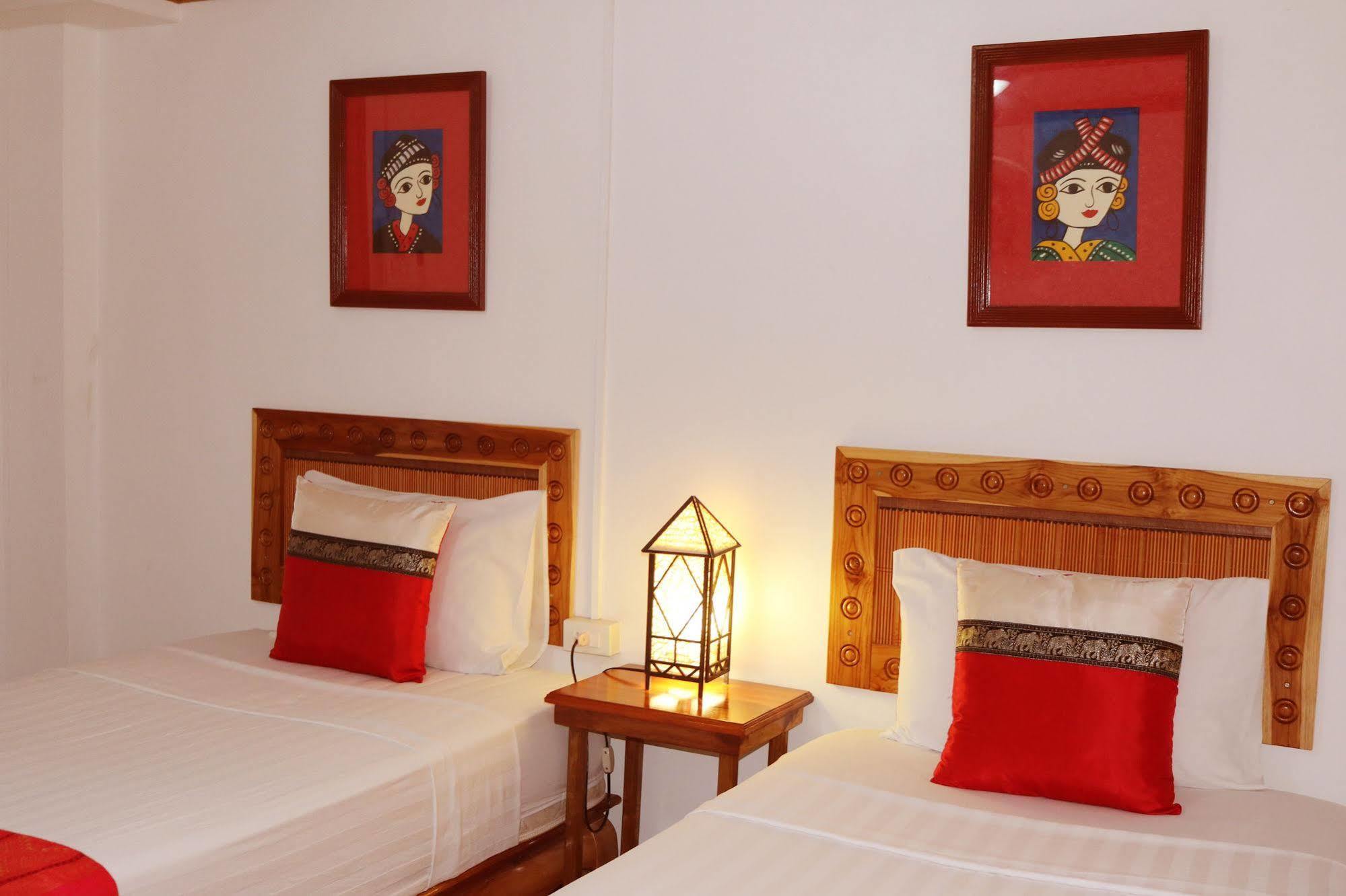 לואנג פרבאנג Apple Guesthouse מראה חיצוני תמונה